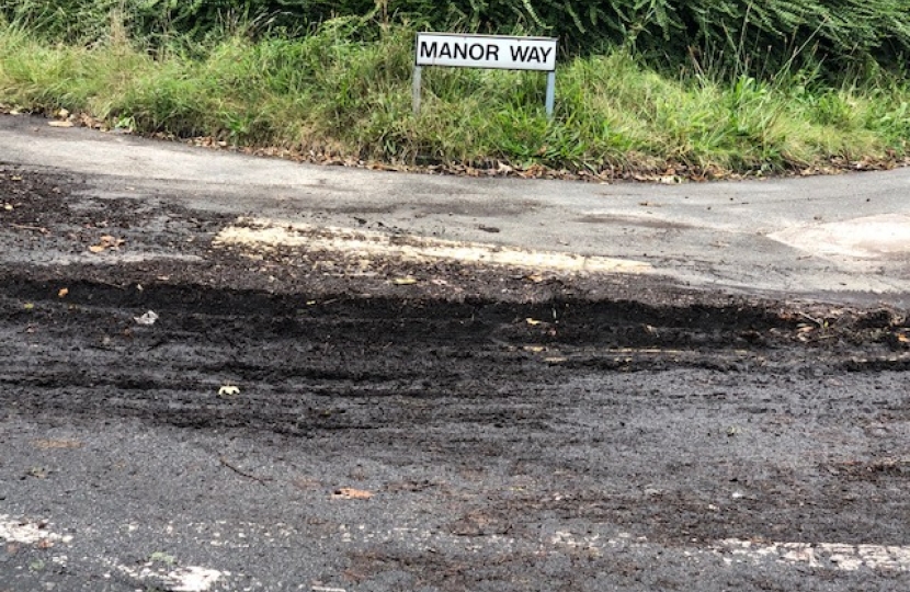 Debris and mud on road at Manor Way South Croydon 