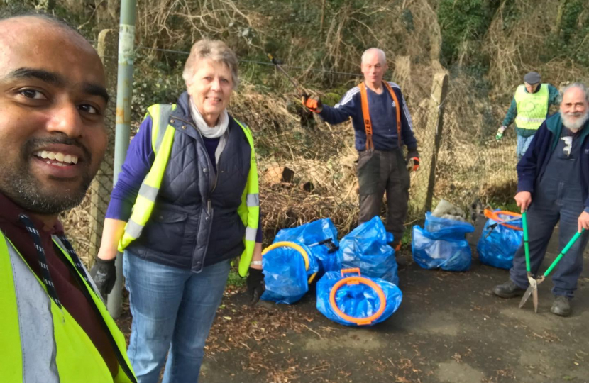 Cllr Margaret Bird and Nikhil Thampi  with results of litter clearing