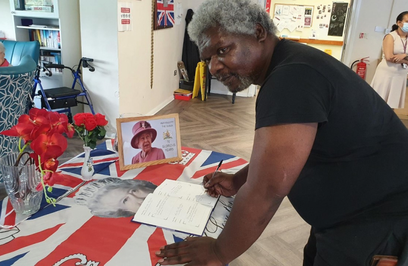 Residents at Toldene Sign the Book of Condolence