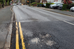 View of Farley Road showing faulty repairs